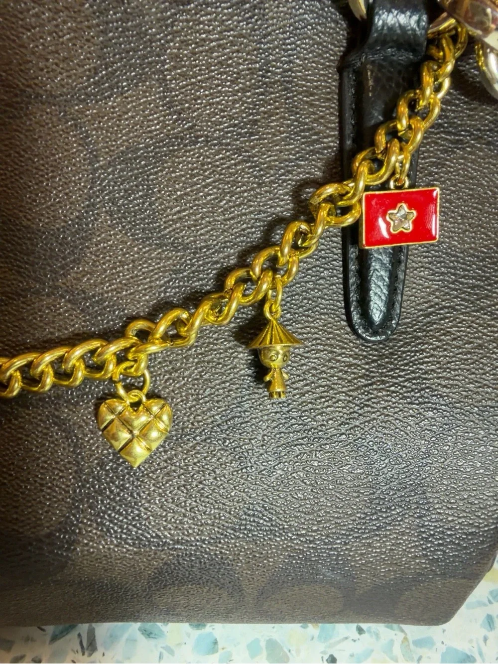 Coach Gold-Tone Charm Bracelet with Pink & Blue Mushroom and Red Book Charms
